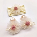 Close-up of beige baby headband and socks set with large chiffon floral decorations - Beige