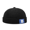 Gorro docker negro de pana para hombre y mujer con detalle de etiqueta de cuero azul - Ajustable / Negro