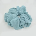 Close-up of oversized dusty blue chiffon hair scrunchie with pleated fabric texture - Haze Blue (4-3)
