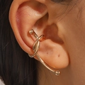 Ear cuff lava irregolare in oro dal design minimalista e lineare per orecchi senza buco - Linea di Torsione Oro (10439)