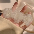 Elegant white organza rose hair clip featuring three delicate camellia flowers - Off White