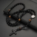 Macro detail of men's religious rosary necklace with lava stones and cross pendant - 8mm Matte Black Stone No. 4 With Alloy Medal