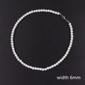 Detail view of long 6mm pearl necklace featuring silver lobster clasp on black background - 45cm / 6mm