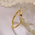 Macro view of gold plated ring featuring red and white square-cut zircon stones - Adjustable Open / Gold with Red and White Square Zirconia (13843)