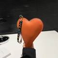 Orange heart-shaped bag with litchi texture and colorful LOVE embroidered wide strap - Orange
