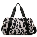 Large capacity cow pattern travel bag in waterproof oxford fabric with shoulder straps - Black