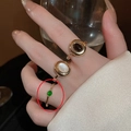 Detailed view of a vintage gold-plated ring set featuring opal and emerald green beads - Vintage Colorful Gemstone Ring Set of 3 / 19# Gold-3pcs Set