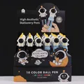 Close-up of 10-color retractable ballpoint pens with 3D astronaut toppers in a display box - 7961 Astronaut 10-Color Ballpoint Pen