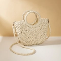 Detail of half-moon woven straw bag with circular handles and silver metal D-ring buckle - Off White