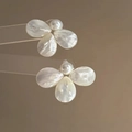 Detailed close-up of petal earrings with shell texture and white pearl center - 6# Silver Earring Post - Cream White Shell Texture Flower
