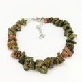 Detailed view of natural Unakite chip stone bracelet with adjustable silver lobster clasp - Unakite
