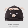 Close-up of baby pilot knit hat featuring cartoon animal ears and goggle embroidery - 48cm 6 Months-2 Years / Black