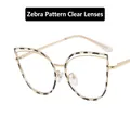 Cat eye glasses in gold metal frame featuring stylish zebra print and clear lenses - Zebra Pattern