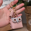 Portamonete a forma di gufo in pelle PU rosa con portachiavi dorato e nappa rosa - Rosa