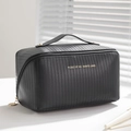 Black PU leather checkered toiletry bag with top handle and gold lettering finish - Black