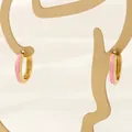 Detail of 18K gold-plated hoop earrings with pink enamel finish on gold metal stand - 3*15mm / Pink