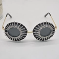 Retro round sunglasses with gold frame and sparkling rhinestones in a sunray design - Gold/Black