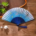 Chinese style folding fan featuring blue butterfly and cherry blossom patterns with tassel - 26 Blue Butterfly Cherry