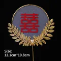Chinese wedding cake topper with red Double Happiness symbol and golden leaf frame - Iron Art Golden Leaf Double Happiness