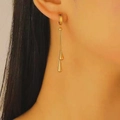 Eleganti orecchini pendenti dorati con design a doppia goccia e finitura in metallo lucido - Orecchini (6234) / Oro