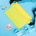 Waterproof neon yellow waist bag pouch with adjustable strap on blue water surface - Yellow