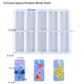 Detail of 10-cavity rectangle resin mold with floral pendant examples and size specs - 10-Cavity Rectangular Pendant Mold