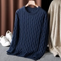 Detailed cable knit pattern on dark blue crew neck cotton sweater hanging on wooden hanger - M / Tops / Navy Blue