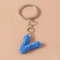 Sky blue letter V keychain with rose embossed texture and silver metal ring - Letter V