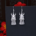 Detail of silver ethnic earrings featuring traditional drum motif and long tassels - Ethnic Drum Shape Tassel Style (E3811)