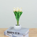 Close-up of white LED tulip night light in a round pot on decorative books - 6 Heads-Light Yellow-Battery Style