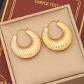 Close-up of gold-plated croissant hoop earrings with textured spiral design on beige velvet - Ribbed C-Shape Style (3#)