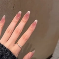 Close-up of pink gradient press-on nails with shiny finish and oval shape for women - Prefabricated Nail Strip / Graceful and Poised