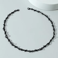 Macro shot of black thorn choker necklace featuring dual lobster clasps and punk metal texture - Necklace / Black