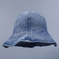 Blue washed denim bucket hat with floral cursive embroidery and ruffled edges for women - M (56-58cm) / Light Blue