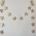 Glittery gold star garland for birthday party decoration hanging on white background - 4 Meters / Glitter Champagne Stars