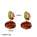 Polished gold stainless steel teardrop earrings with amber resin beads, 7.3g weight - Amber Oval Style (TE60665)