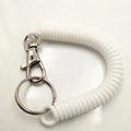 White plastic spiral spring keychain with metal lobster clasp and ring for secure anti-loss - Cream White