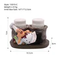 Cute resin fat chef figurine holding two white ceramic salt and pepper shakers - 15019-C Reclining Chef Spice Jar