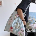 Eco-friendly cotton tote bag with blue stripes and vintage floral prints on a shoulder strap - Standard Large / Blue Flower
