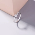 Detailed macro view of an elegant silver ring with a large oval zircon and small diamonds - Silver Oval Main Stone