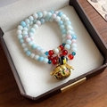 Beaded bracelet with white and blue pearls featuring a gold enamel ball pendant in gift box - Gold-White Beaded (101#)