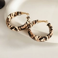 Macro view of leopard print leather earrings with gold metal posts and clear backings - Silver Pin Round Small