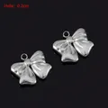 Pendentif nœud en acier poli argenté pour bijoux DIY avec une largeur de 1,6 cm - Style E / Acier
