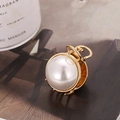 Elegant large gold metal hair claw clip with oversized white pearl detail for women - Pearl Surface Small Claw Clip / Gold