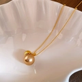 Elegante collana di perle champagne con catena placcata oro in una ciotola a conchiglia - Perla Singola Oro Champagne (51# Collana-Oro)