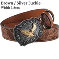 Detail of 3.8cm western cowboy belt with bull head buckle and floral embossed leather - Brown Silver Buckle (Eagle)