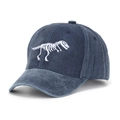 Detail of white dinosaur skeleton embroidery on washed navy denim baseball cap - 52-54cm / Navy Blue