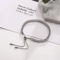 Detailopname van een zilveren drakenbot-kettingarmband met verstelbare schuifsluiting - Zilver