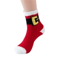Detail of coral fleece Christmas sock featuring Santa Claus belt design and soft texture - One Size / Red Belt