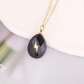 Detail of teardrop black stone pendant with gold lightning motif on stainless steel chain - Black Water-drop Lightning (6#)